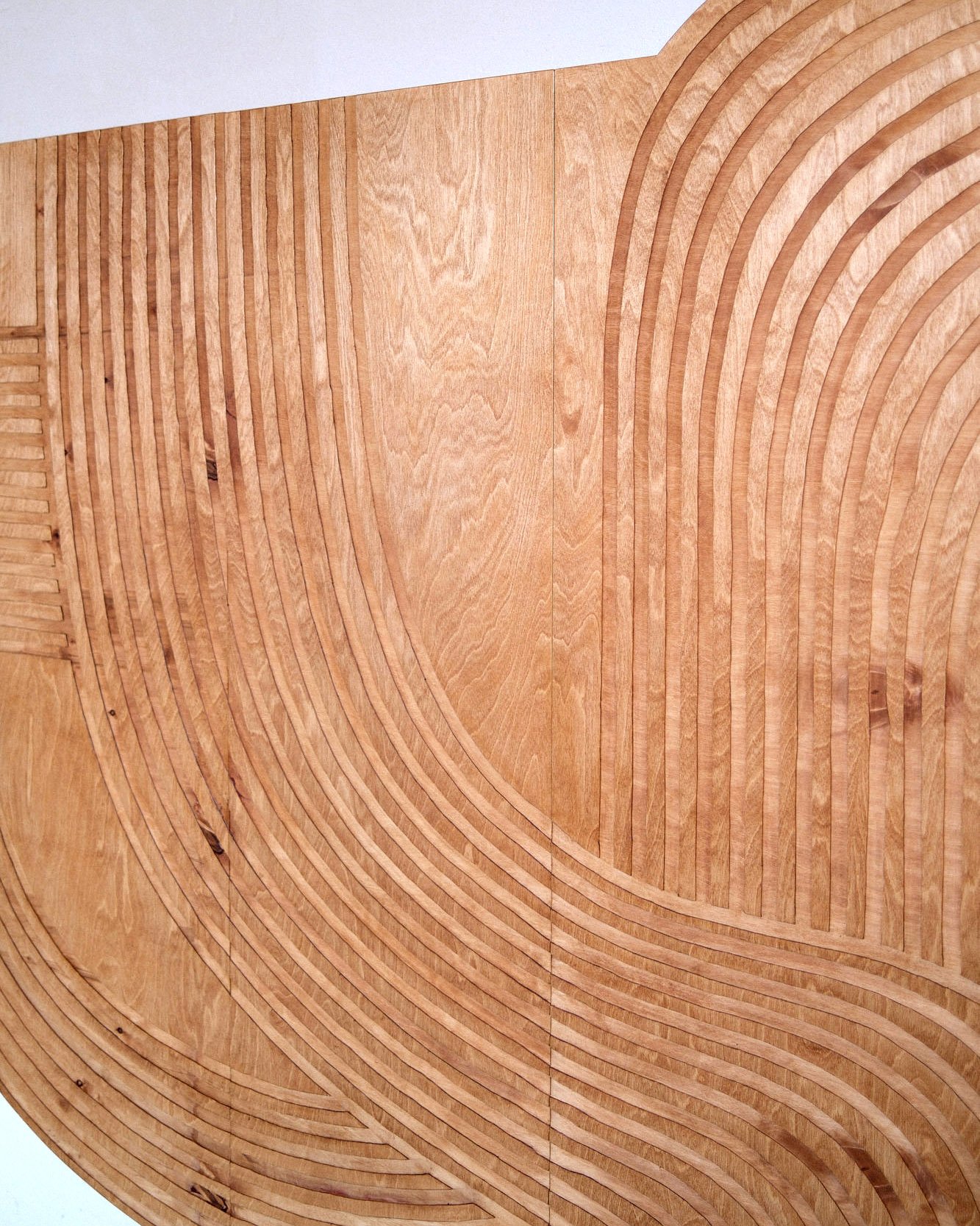 Hand-routed relief on the Hanging Cabinet by Studio Goons. Photograph by Studio Goons.